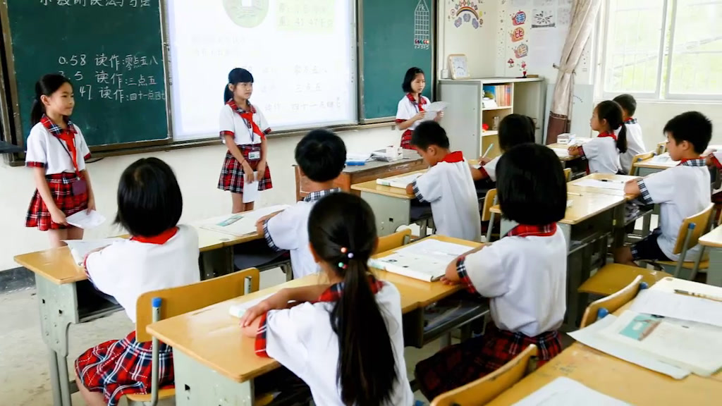 1.人教版数学四下《小数的读法和写法》广西省一等奖