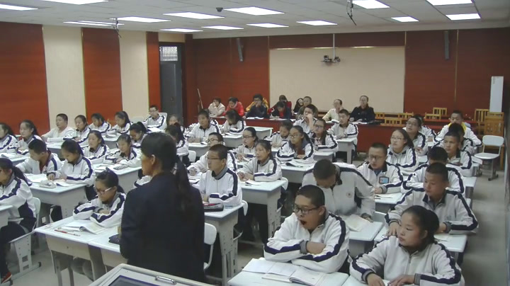 人教版数学九上《关于原点对称的点的坐标》建设兵团老师-市一等奖