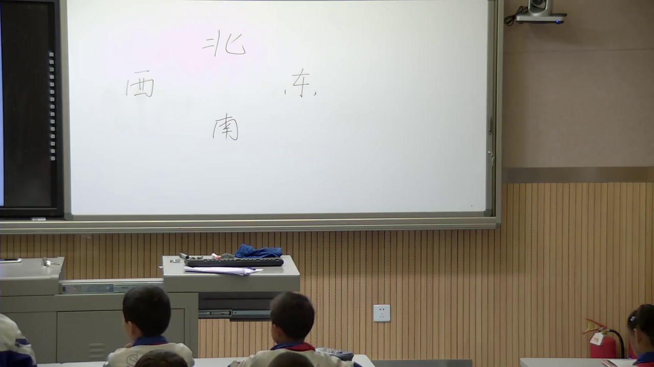 苏教版数学二下《1、认识东、南、西、北》青海靳老师-市一等奖