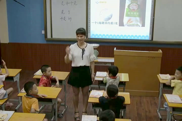 冀教版数学二下《认识千克和克》广西黄老师-全国一等奖